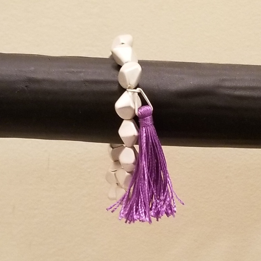 Bracelet with purple tassel